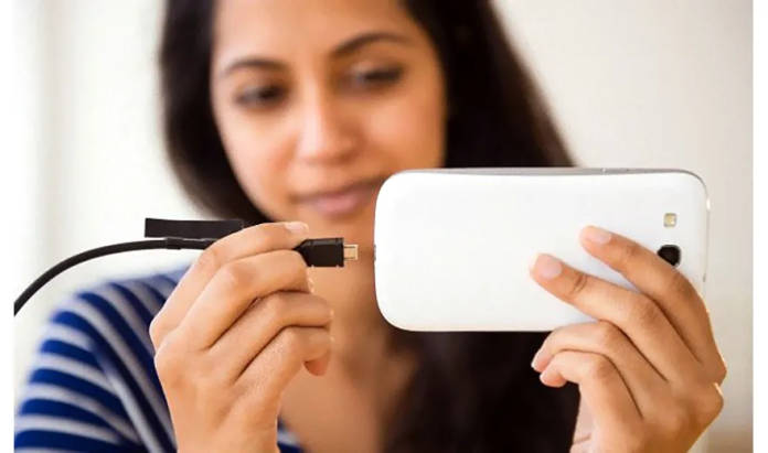 girl charginf phone