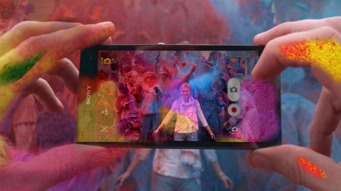 https://static.hub.91mobiles.com/multisite/wp-content/uploads/sites/7/2018/03/Mobile-in-Holi.jpg