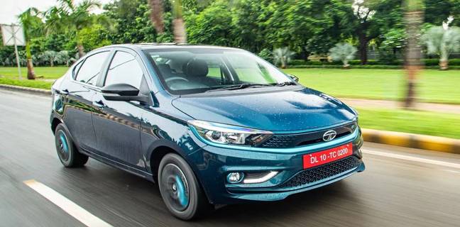 गजब!, 5 महीने में 12,500 km चलाई ये इलेक्ट्रिक कार, खर्च आया Rs 0 Tata Cheapest electric car Tigor EV price range sale